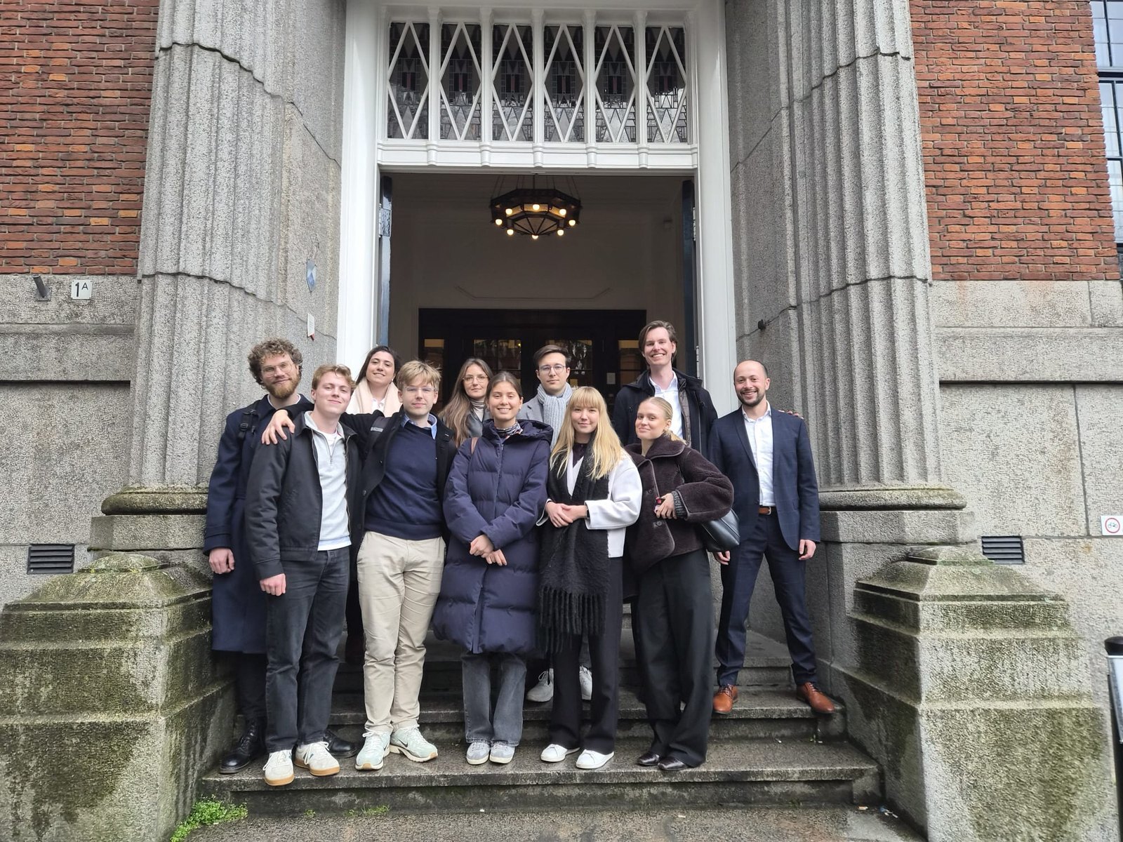 The 2025/2026 cohort on the steps after a session